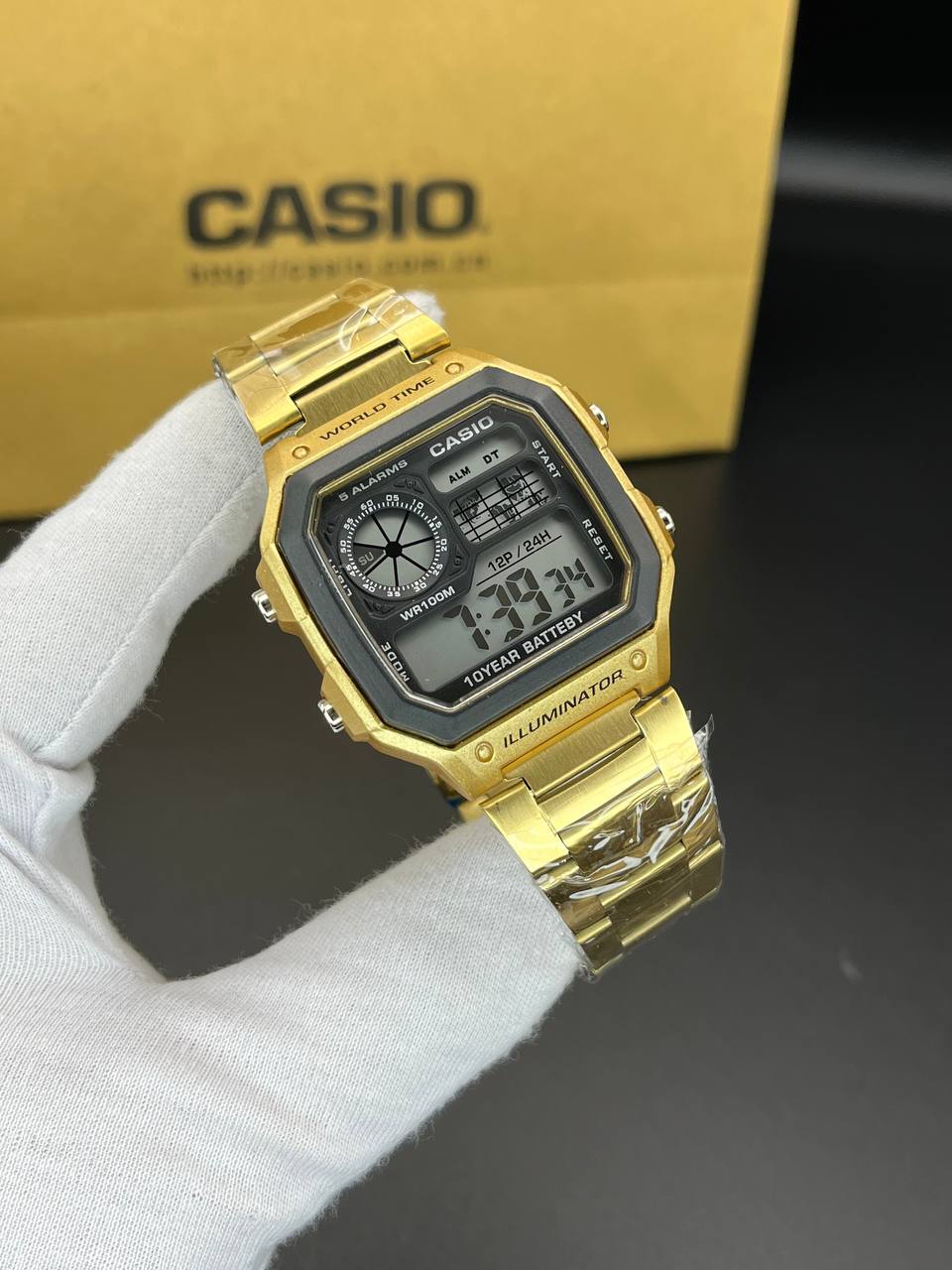 ساعت مردانه  Casio مدل جهان نما طلایی _بند استیل رنگ ثابت