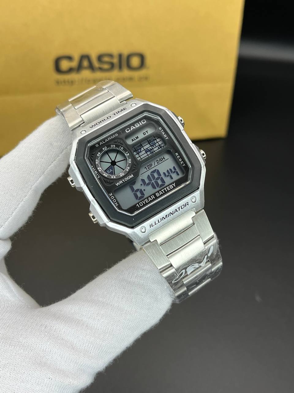 ساعت مردانه  Casio مدل جهان نما نقره ای_بند استیل رنگ ثابت