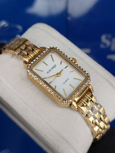 ساعت زنانه Elgeance مدل قاب مستطیلی دور نگین بند استیل _طلایی صفحه سفید